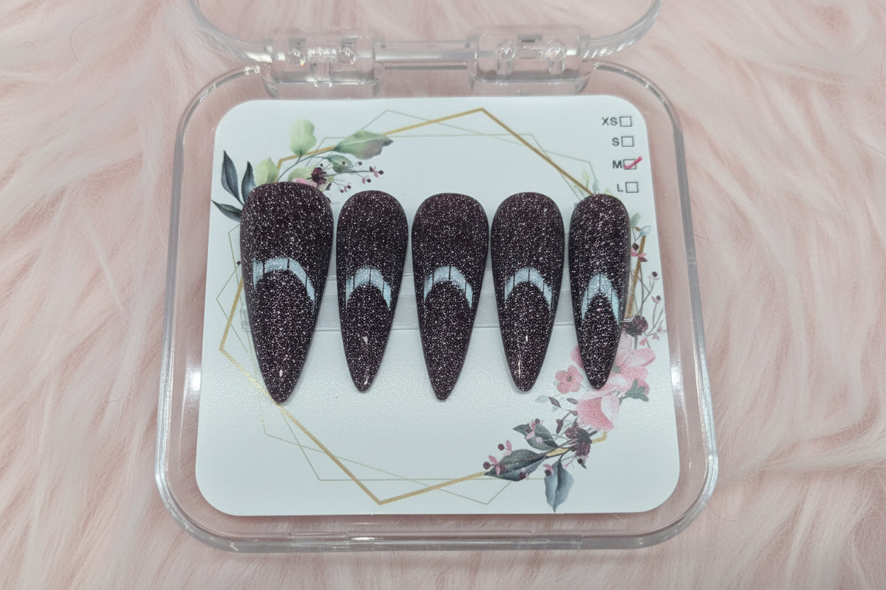 Long stiletto with black reflective polish
