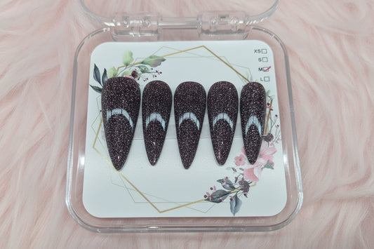 Long stiletto with black reflective polish